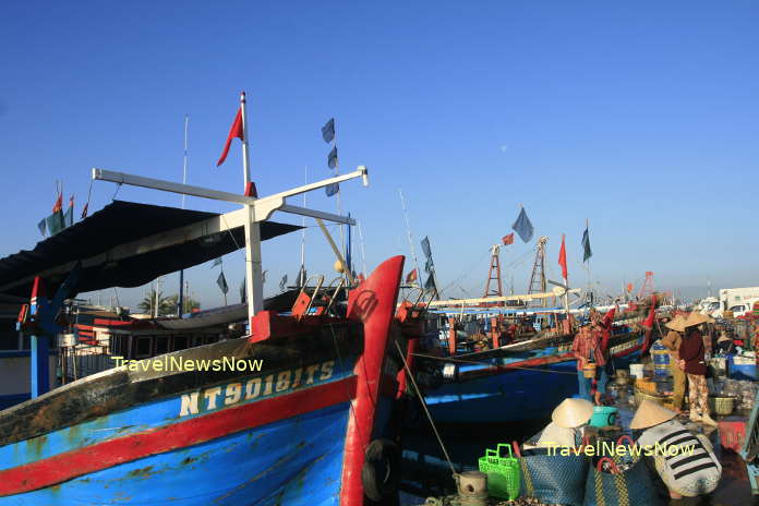 Boats on the Ca Ty River near the Con Cha Fish Market in Phan Thiet Vietnam