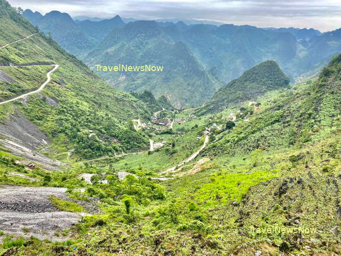 A tiny path through the rocky mountains at Ta Phin in the Dong Van Plateau, Ha Giang, Vietnam