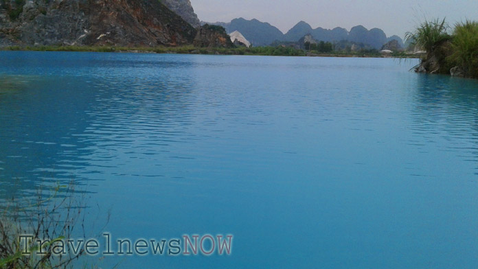 Turquoise blue water lake in the country of Thuy Nguyen, Hai Phong, Vietnam