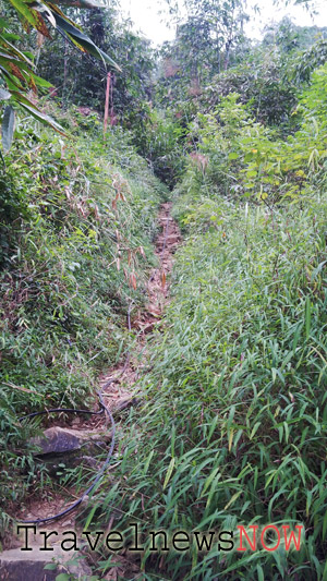 Slippery path to the Na Lay Mountain at Bac Son