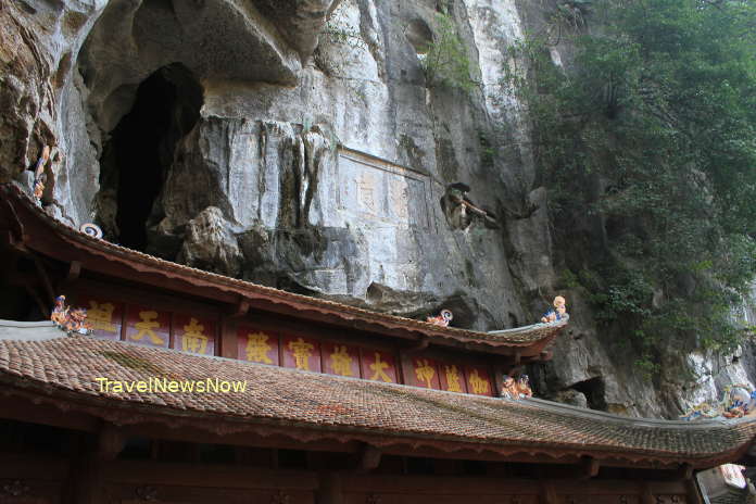 The Middle Pagoda (Chua Trung) of the Bich Dong Pagoda Complex is built in a limestone cave of an imposingly high mountain