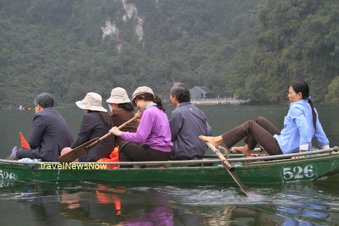 The best way to visit Trang An is by rowing boat