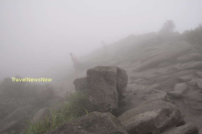 Rocky path amid fog near the top of the Yen Tu Mountain